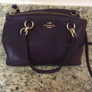 Dark purple crossbody Coach purse